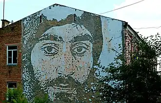 Граффити стрит-арт артиста Vhils в сквере Небесной сотни