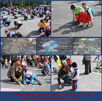 Дети рисуют в день защиты детей.