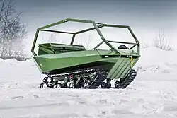 Лёгкий гусеничный вездеход "Пелец Круизер III". Мощность - 30 л.с., масса - 620 кг..