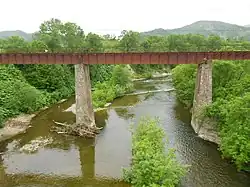 Заброшенный железнодорожный мост через реку Тиобут