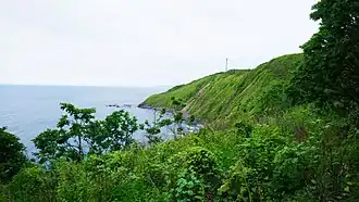 Вид на мыс Скалистый и северо-западный берег бухты