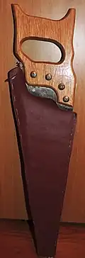 Самодельные ножны из дерматина для пилы по дереву