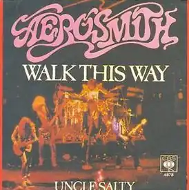Обложка сингла Aerosmith «Walk This Way» (1975)