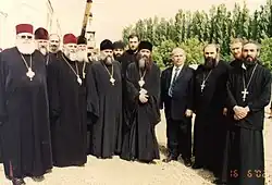 Возложение креста на храме Святого Георгия в Ианети: преподобный Димитрий, преподобный Григорий, преподобный Савва, преподобный Антоний, строитель (Ктитор) храма Акакий (Како) Леквеишвили и другие.