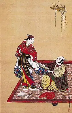 Усач, докучающий юному красавцу