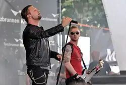 Участники «A Life Divided» Юрген Планггер и Тоби Эггер на фестивале «Amphi Festival 2013» в Кёльне (Германия).