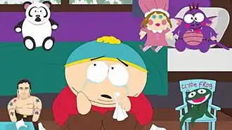 Картман плачет среди своих игрушек