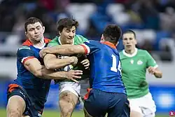 Готовцев (слева в синем) в борьбе против Португалии в феврале 2020