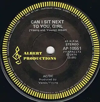 Обложка сингла AC/DC «Can I Sit Next to You, Girl» (1974)