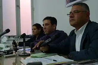 Карим Амер (в центре) произносит своё первое публичное заявление за четыре дня до парламентских выборов в стране. Ноябрь 2010 года