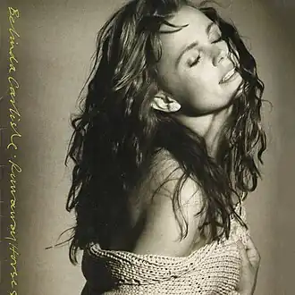 Обложка альбома Белинды Карлайл «Runaway Horses» (1989)