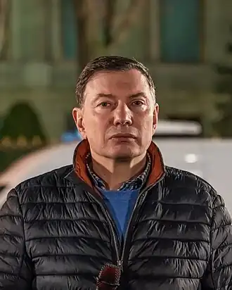 Игорь Эйдман на акции памяти Алексея Навального в феврале 2024 года в Берлина