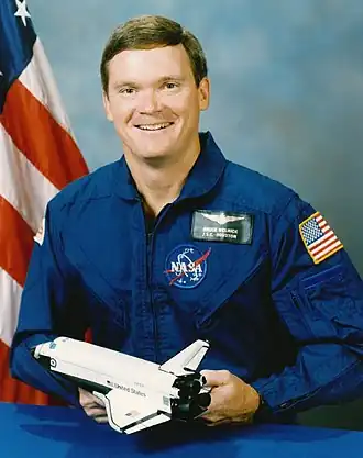 Брюс Э. Мелник