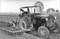 Борона с катком прикреплённая сбоку от трактора. ГДР, середина XX века