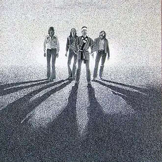 Обложка альбома Bad Company «Burnin’ Sky» (1977)