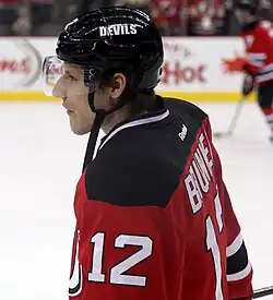 Дамьен Бруннер в составе «Нью-Джерси Девилз» в 2014 году