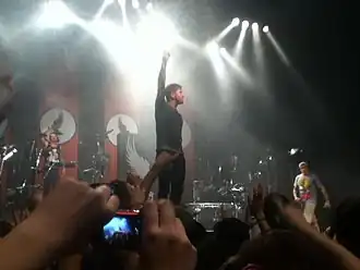 Даниэль на концерте World War 3 Tour, в 2011 году.