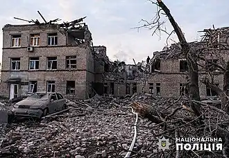 Разрушенное здание городе в феврале 2024 года