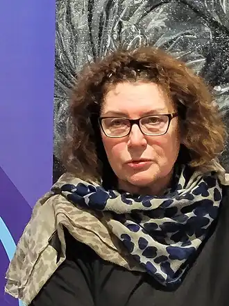 Елена Тима на чтениях Содружества русскоязычных литераторов Германии (СЛоГ) 22 декабря 2023 года в Берлине