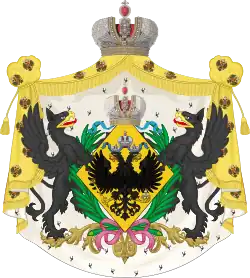 Большой герб Их Высочеств и их Светлостей есть двоеглавый Российский орел без гербов на груди и крыльях, в щите ромбоидальной формы, под Императорскою короною. Щит украшен пальмами и знаками ордена Святой великомученицы Екатерины. Щитодержатели суть два черные грифа с червлеными глазами и языками; вместо Императорской сени золотая мантия, усеянная двоеглавыми орлами, подложенная горностаем.