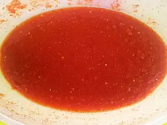 Молотый красный перец, ганский деликатес, в основном сопровождающий банку и кенки