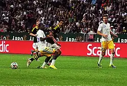 Джолчиев (№&nbsp;22) в матче АИК&nbsp;— «Астана», 2014 год.