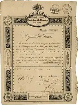 Акция Анонимного общества садоводства и ботаники Ганда на 100 франков, выпущенная в Генте 1 апреля 1835 года, подписанная собственноручно его президентом Жозефом ван Кромбрюгге, мэром Гента. Основанное в 1808 году, общество с 1809 года организовывало цветочные выставки по английской модели.