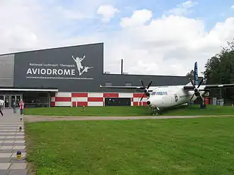 При входе в музей стоит второй прототип самолёта Fokker 50