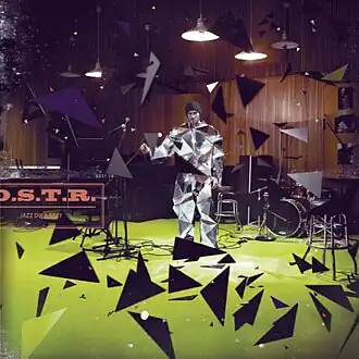 Обложка альбома O.S.T.R. «Jazz, dwa, trzy» (2011)