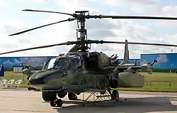 Второй лётный экземпляр Ка-52 (бортовой №&nbsp;062) с&nbsp;макетами поисково-прицельной и&nbsp;обзорно-пилотажной систем на МАКС-2009.