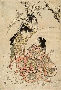 Трое детей играют в снегу