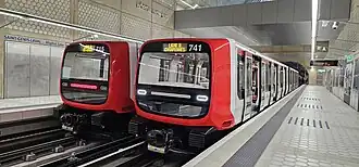 Поезд на станции «Сен-Жени-Лаваль — Опиталь Лион Сюд»