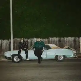 Обложка сингла Machine Gun Kelly и Джелли Ролла «Lonely Road» (2024)