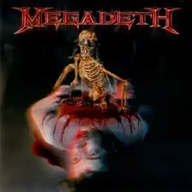 Обложка альбома Megadeth «The World Needs a Hero» (2001)