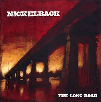 Обложка альбома Nickelback «The Long Road» (2003)