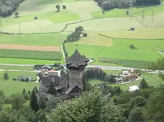 Замок на фоне деревни