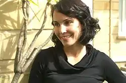 Нуми Рапас«Девушка с татуировкой дракона»