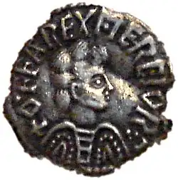 Coin with a man in profile surrounded by lettering reading OFFAREXMERCIOR