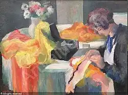 Женщина за шитьём