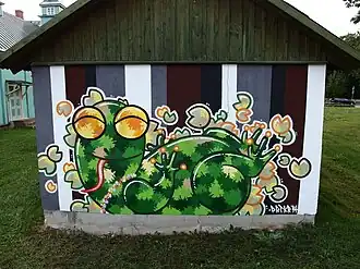 Граффити на стене подсобного здания Народного дома