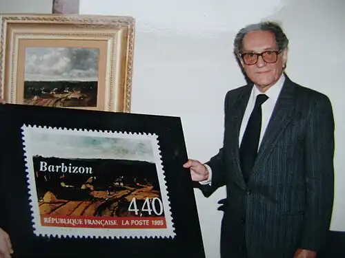 Презентация искусствоведом Пьером Микелем[фр.] французской марки с репродукцией картины Нарсиса Диаса «Хижины Барбизона» (1995)