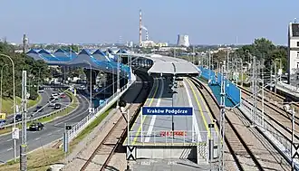 Остановочный пункт Краков-Подгуже.Платформа №1 Линии №624[пол.].Вид с запада, с путепровода над аллеей Силезских повстанцев.Справа платформа №2 Линии №94[пол.]