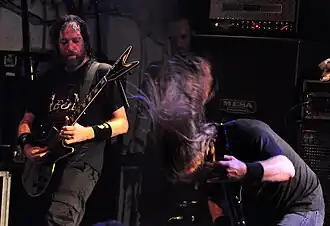 Роб Барретт (слева) и Алекс Уэбстер на концерте Cannibal Corpse