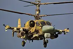 Серийный Ка-52 (бортовой №&nbsp;34, серийный №&nbsp;02-04) первых выпусков с&nbsp;4&nbsp;узлами подвески вооружения, оснащённый ГОЭС‑451. Отсутствуют СОЭП, УФ-пеленгаторы пуска ракет и&nbsp;устройства выброса пассивных помех БКО (ЭВУ не установлены), 12 июля 2015 года.