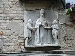 Святой Иоанн Милостивый. Горельеф над входом в церковь