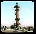 Вид на Ростральную колонну со стороны Дворцового моста (Брэнсон Де Ку, 1931)