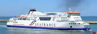 Пассажирский паром «SeaFrance Rodin» компании SeaFrance. На трубе эмблема с использованием цветов государственного флага (цвета государства) напоминающая заглавные буквы компании "S" и отчасти "f". Фото от 25/07/2007