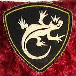 Нарукавная нашивка военнослужащих Уральского округа внутренних войск (1992−2001), Уральского регионального командования (с 2001) внутренних войск МВД России.Нашивается на правый рукав.