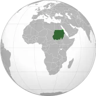 Судан на карте мира.Светло-зелёным обозначена спорная территория т. н. «Халаибского треугольника»