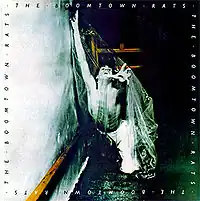 Обложка альбома The Boomtown Rats «The Boomtown Rats» (1977)